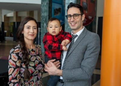 Family portrait with a young child.