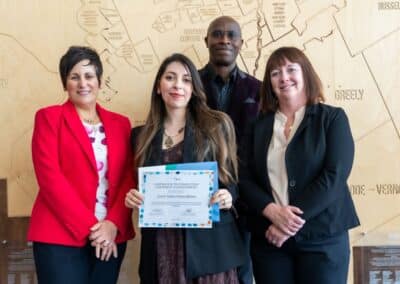 Graduation ceremony with certificate recipients