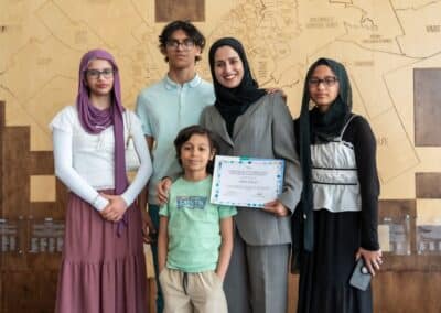 Family celebrating graduation achievement together.