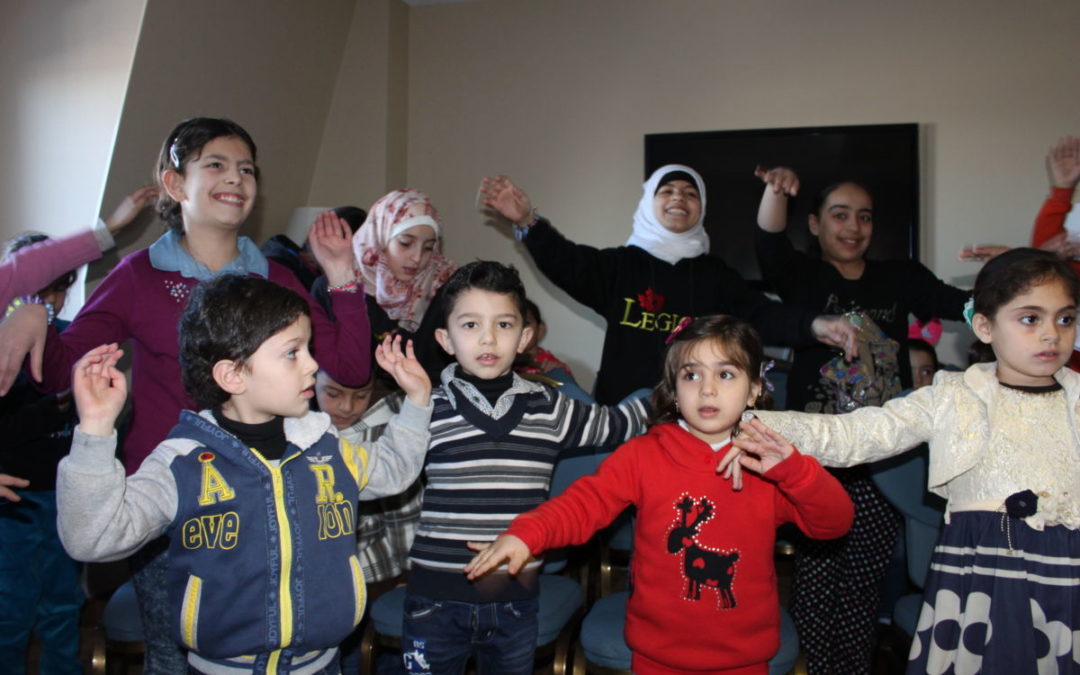 Syrian children playing at a program at the Radisson Hotel in Ottawa
