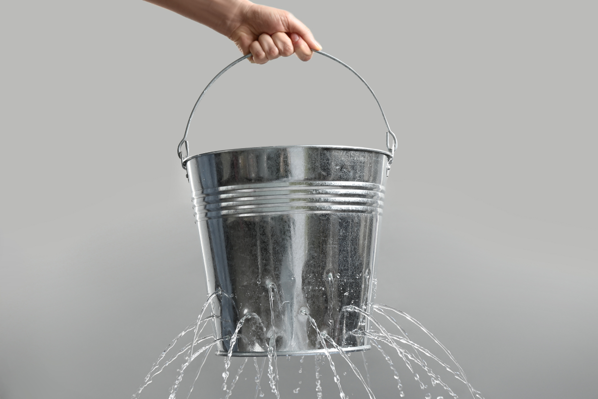 A bucket leaking water
