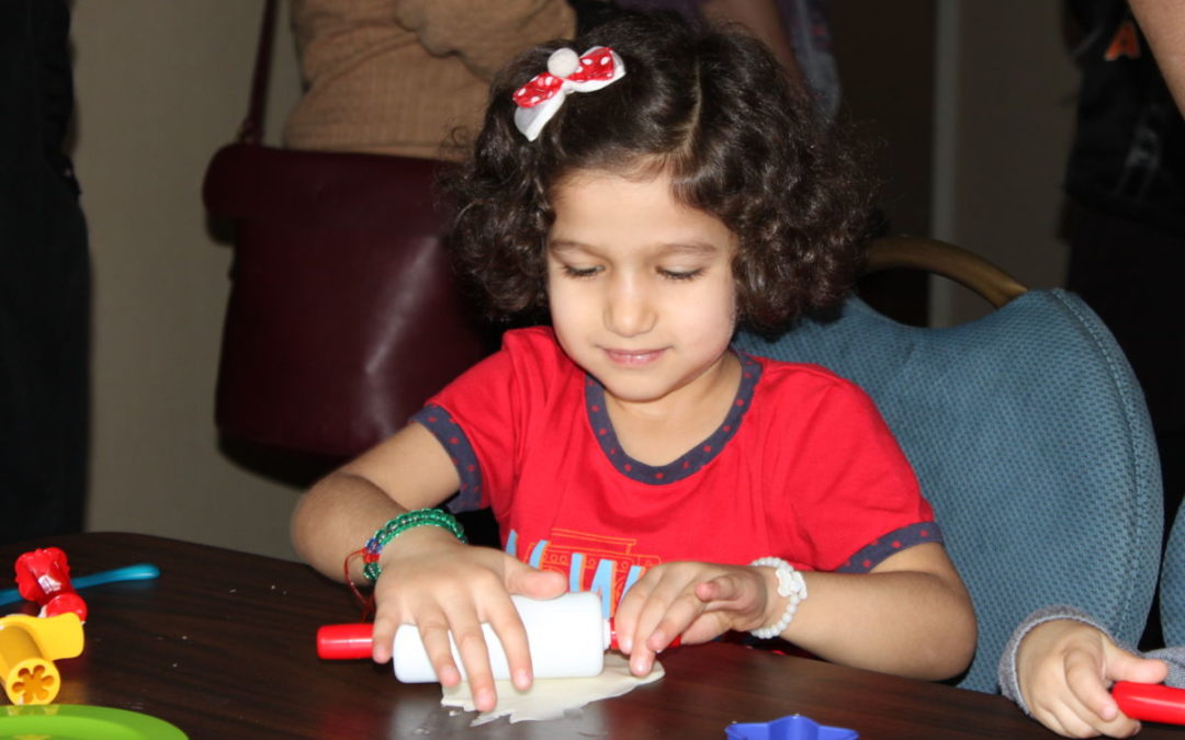 Young Syrian girl playing